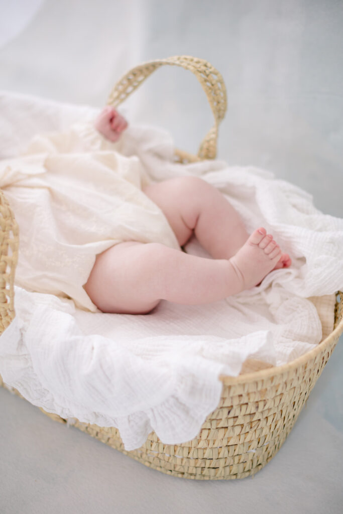 beautiful blondehaired baby in a basket