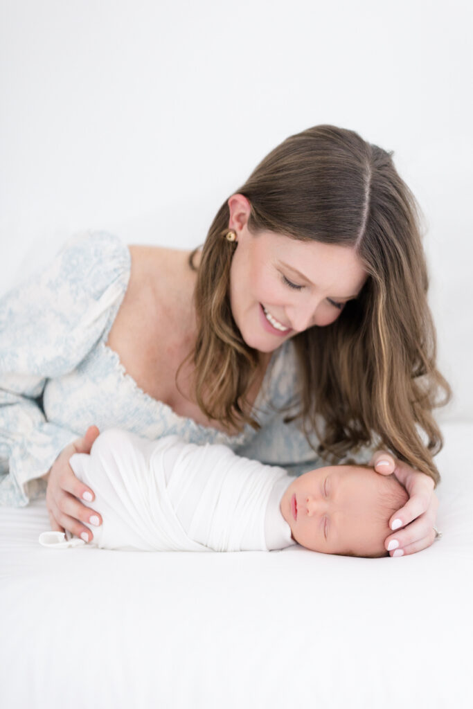 mom with her newborn in ct studio