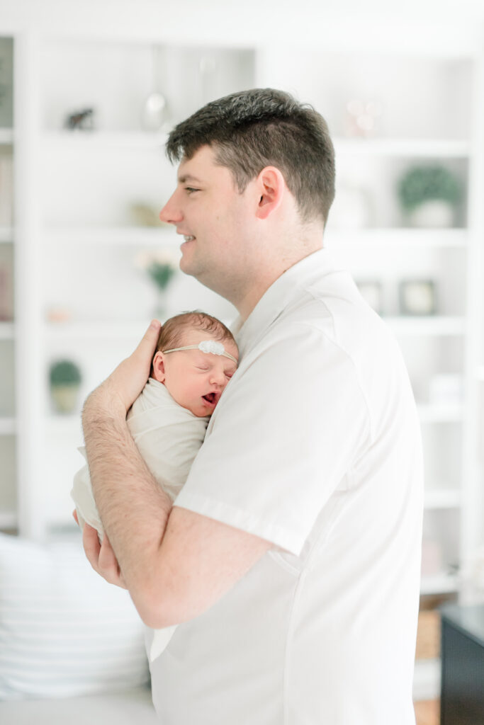 Newborn baby swaddled in neutral tones at Oak and Lore Studios Connecticut