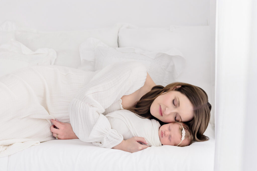 Natural light newborn photography session in Fairfield County CT featuring a sleeping infant