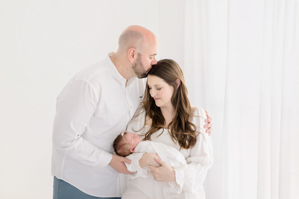 Lifestyle newborn feeding photo documenting a special bonding moment in Fairfield County Connecticut