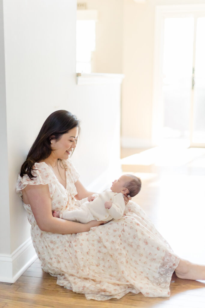 Baby sleeping in a cozy basket during a newborn baby photoshoot in Fairfield County