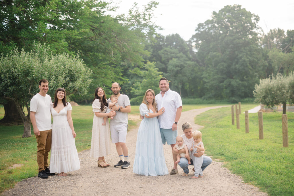 Large family portrait captured during an outdoor session in Connecticut