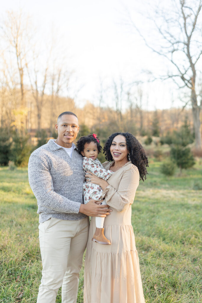 Connecticut family portraits among rows of Christmas trees
