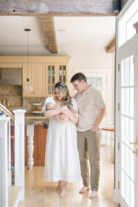 Newborn baby photoshoot in Fairfield County CT with soft neutral clothing